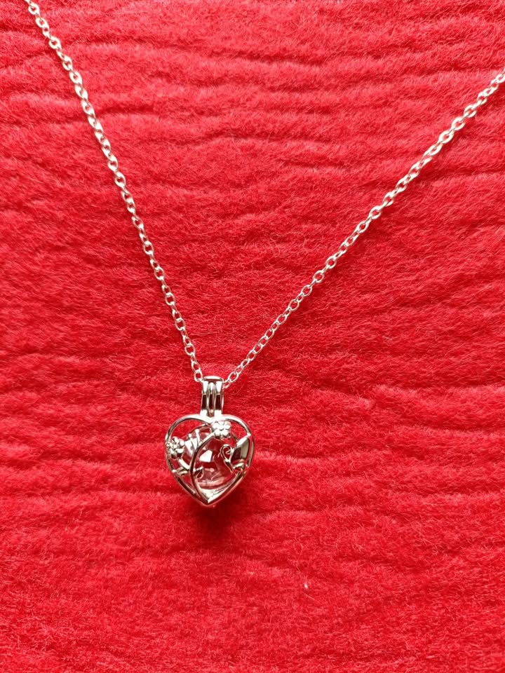 Precious pink sapphire pendant and silver necklace